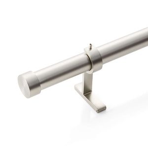 One Crate & Barrel finial and curtain rod set